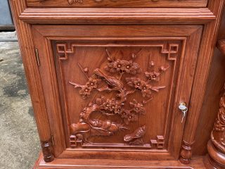 Kệ tivi 2m4 gỗ hương đá mẫu cột nho con sóc đục tứ quý (Anh Hảo, Quảng Ninh)