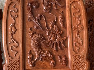 Bàn ghế rồng đỉnh gỗ hương đá tay 16 chân 16 hàng liền khối đục tay 2 mặt