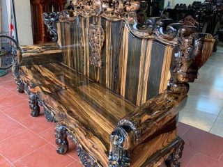 Bộ bàn ghế Hoàng Gia 2m6 gỗ mun hoa Lào vân hoa siêu đẹp