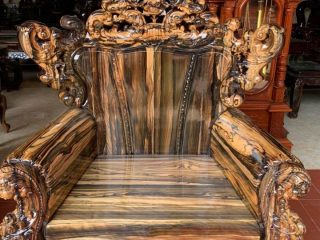 Bộ bàn ghế Hoàng Gia 2m6 gỗ mun hoa Lào vân hoa siêu đẹp