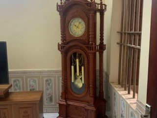 Đồng hồ cây tứ trụ mặt tròn