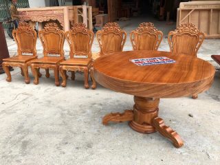 bàn tròn nguyên khối gỗ gõ đỏ