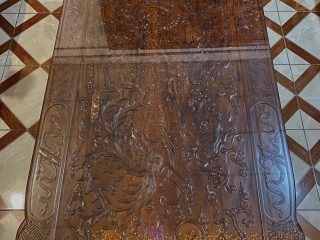 bàn trà đục tứ linh quần tụ